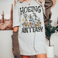 Hoeing Ain’t Easy Tee